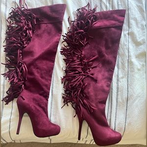Burgundy knee-high tassel boots